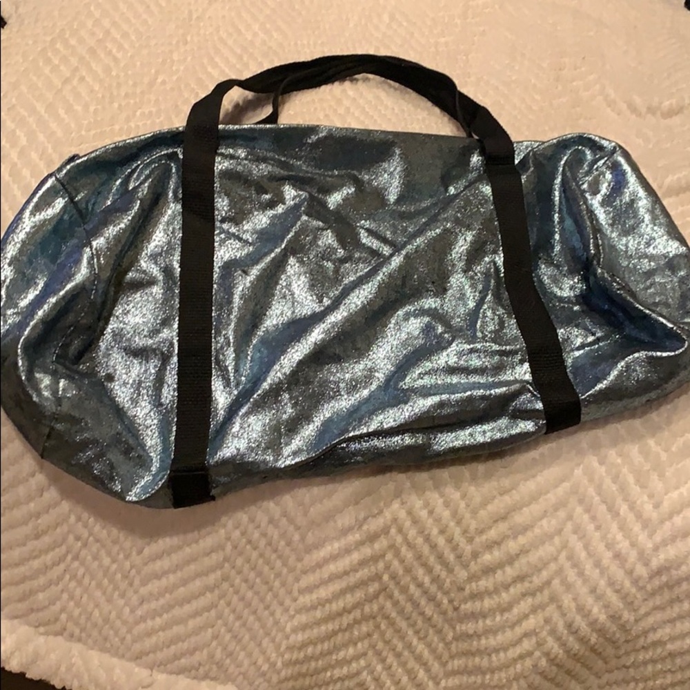 Baby blue sparkly duffel bag